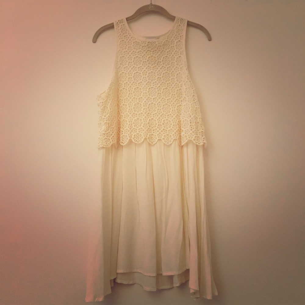White shift dress with eyelet overlay